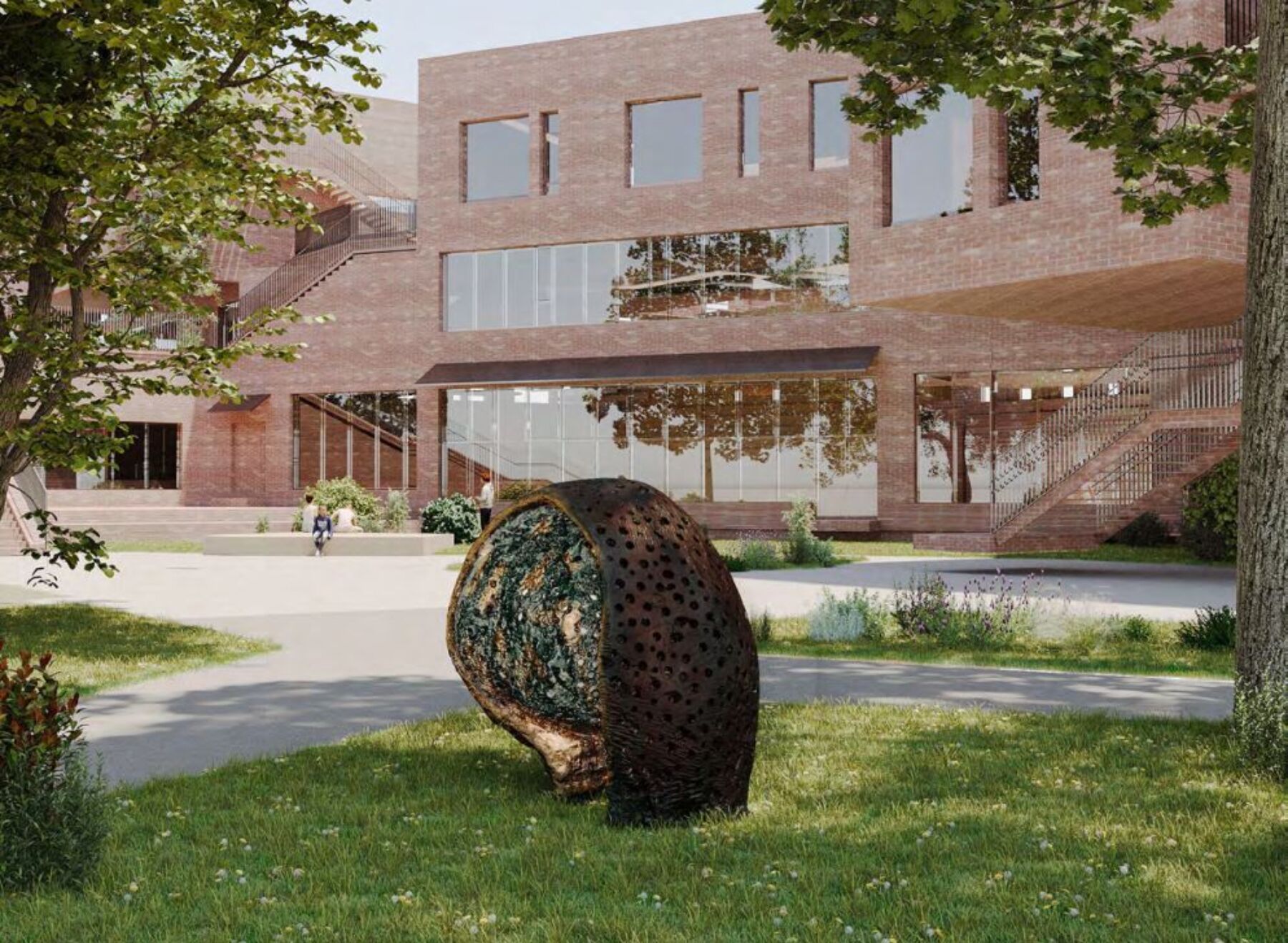 Kunstverk plassert i skolegården, med skolen og barn i bakgrunnen. Foto