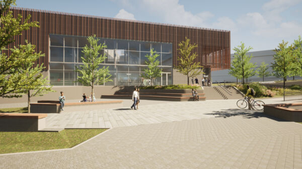 Illustrasjon av utsiden av en svømmehall, med parkanlegg og torgplass foran.